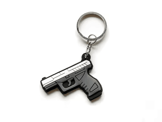 โลโก้ที่กำหนดเองพวงกุญแจมินิปืนของเล่นซิลิโคนพวงกุญแจ PVC อ่อน