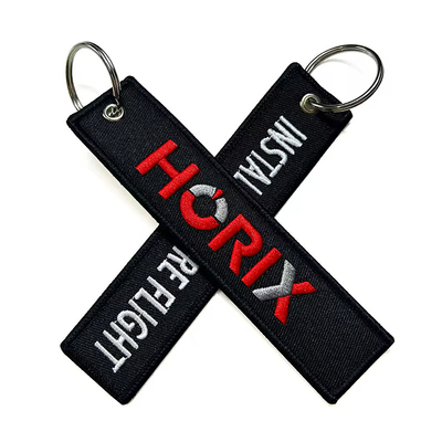 ขายปลีก Olecranon Hook ราคาถูก ผ้าเครื่องบินที่กําหนดเอง การขีด แท็กเจ็ท สายกุญแจผสมด้วยโลโก้ของคุณเอง