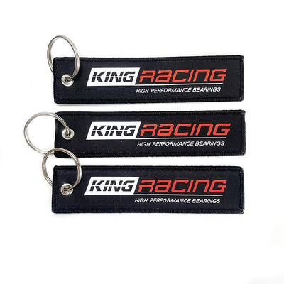 Custom Wholesale Woven Fabric Keychain Key Tag Custom Jet Tags การขีดผ้าสําหรับงานปาร์ตี้
