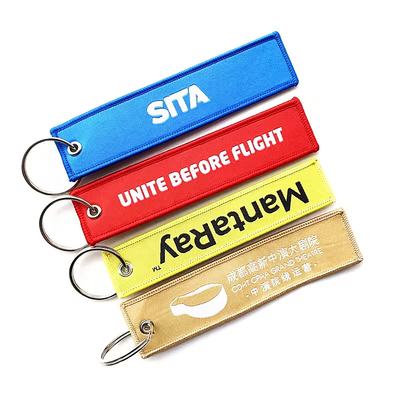 Custom Wholesale Woven Fabric Keychain Key Tag Custom Jet Tags การขีดผ้าสําหรับงานปาร์ตี้