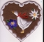 เหล็กบนเสื้อผ้าเย็บปักถักร้อย Patch ประเทศ Goose Edelweiss Heart Twill Fabric Background